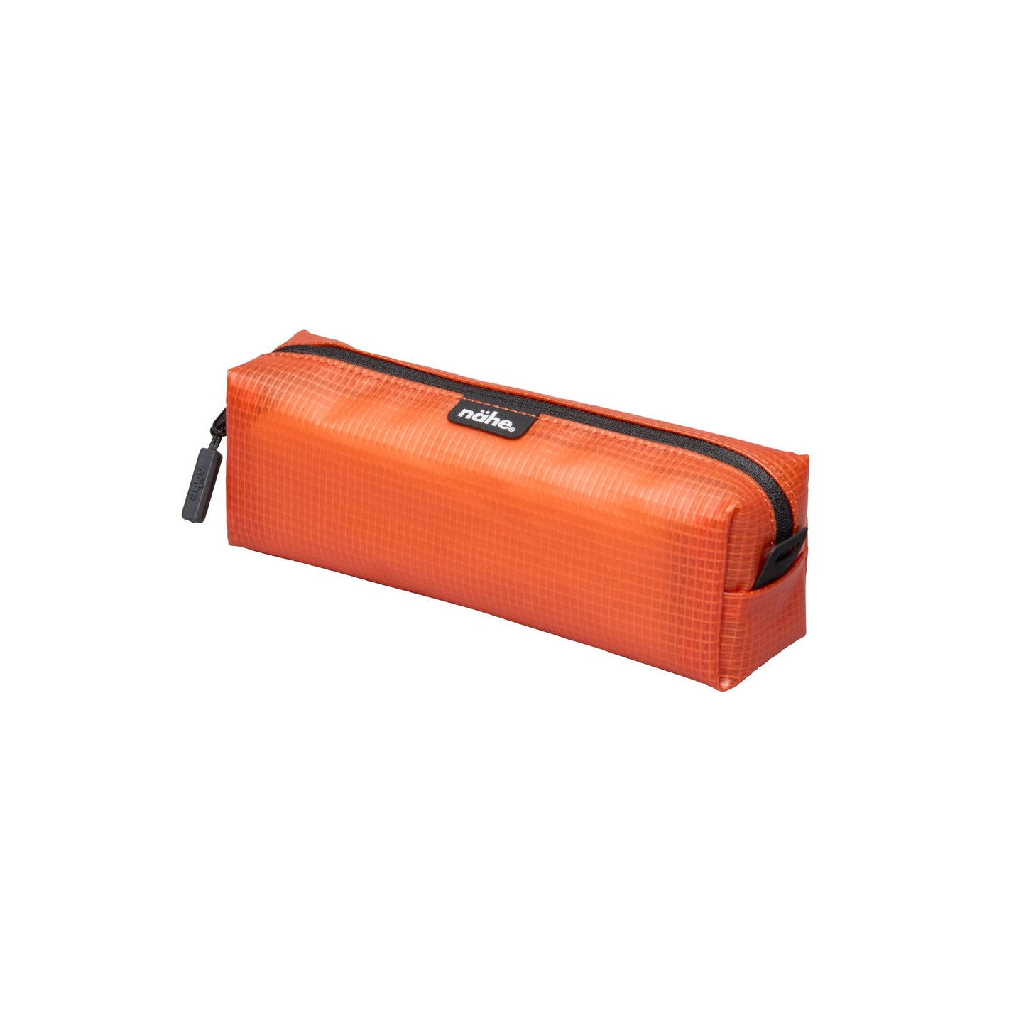 Nähe Soft Grid Pouch in Orange, a rectangular grid-textured case with black zipper and logo tab.
